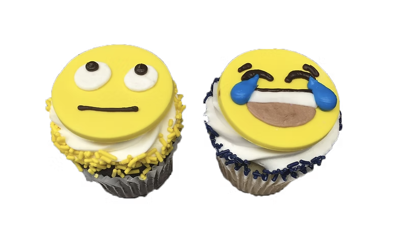 Emoji-decorated cupcakes