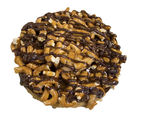 Salted caramel cookie topped with pretzel pieces and chocolate drizzle