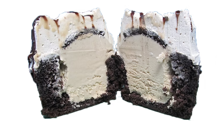 Coffee ice cream cupcake cut in half showing coffee ice cream center with chocolate drizzle